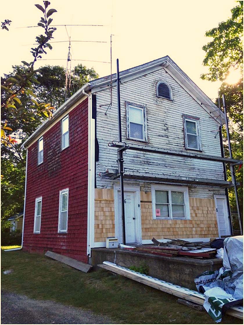 Exterior of the building during re-shingling