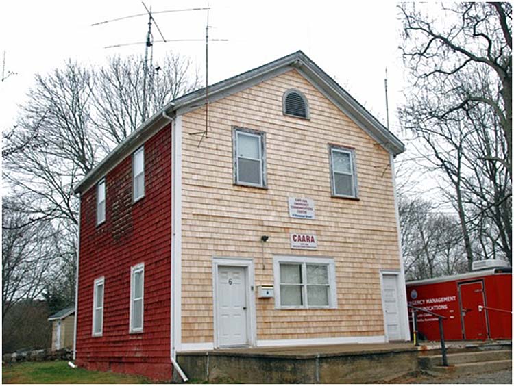 Front of building with freshly shingled face